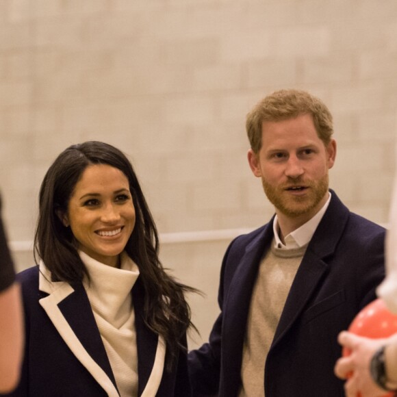 Le prince Harry et sa fiancée Meghan Markle assistent à une séance de formation des apprentis coaches au Nechells Wellbeing Centre à Birmingham le 8 mars 2018.