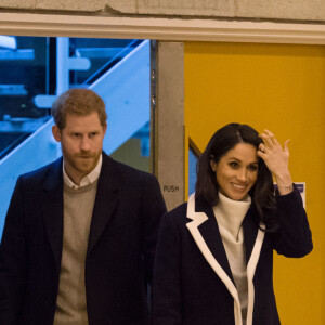 Le prince Harry et sa fiancée Meghan Markle assistent à une séance de formation des apprentis coaches au Nechells Wellbeing Centre à Birmingham le 8 mars 2018.