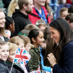 Le prince Harry et sa fiancée Meghan Markle viennent célébrer la journée internationale de la femme à Millennium Point à Birmingham le 8 mars 2018.