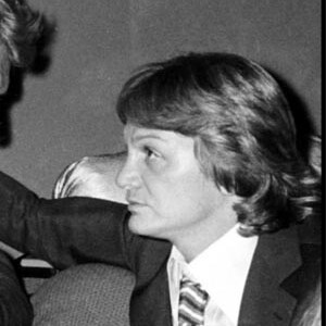 Johnny Hallyday et Claude François lors d'une soirée à Paris en 1976.