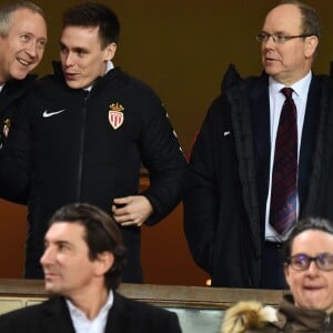 De gauche à droite, Vadim Vasilyev, le vice président de l'AS Monaco, Louis Ducruet et le prince Albert II de Monaco et Louis Ducruet durant la rencontre de football de Ligue 1 opposant Monaco à Lille au stade Louis II le 16 mars 2018. Le prince Albert II de Monaco qui célébrait ses 60 ans le 14 mars, a eu comme premier cadeau la victoire de son club et à la fin de la rencontre les joueurs lui ont offert un ballon et un maillot floqué du texte : Joyeux Anniversaire SAS. © Bruno Bebert/Bestimage