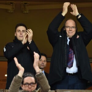 Louis Ducruet, à gauche, et le prince Albert II de Monaco durant la rencontre de football de Ligue 1 opposant Monaco à Lille au stade Louis II le 16 mars 2018. Le prince Albert II de Monaco qui célébrait ses 60 ans le 14 mars, a eu comme premier cadeau la victoire de son club et à la fin de la rencontre les joueurs lui ont offert un ballon et un maillot floqué du texte : Joyeux Anniversaire SAS. © Bruno Bebert/Bestimage