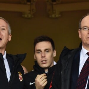 De gauche à droite, Vadim Vasilyev, le vice président de l'AS Monaco, Louis Ducruet et le prince Albert II de Monaco durant la rencontre de football de Ligue 1 opposant Monaco à Lille au stade Louis II le 16 mars 2018. Le prince Albert II de Monaco qui célébrait ses 60 ans le 14 mars, a eu comme premier cadeau la victoire de son club et à la fin de la rencontre les joueurs lui ont offert un ballon et un maillot floqué du texte : Joyeux Anniversaire SAS. © Bruno Bebert/Bestimage