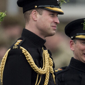 Le prince William, duc de Cambridge, colonel des Gardes irlandais et Catherine (Kate) Middleton, duchesse de Cambridge, enceinte, lors de la parade de la Saint Patrick à Houslow en présence du premier bataillon des gardes irlandais le 17 mars 2018. 