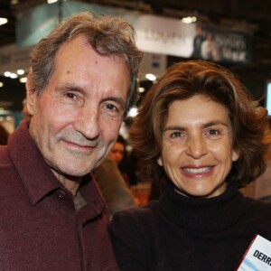 Jean-Jacques Bourdin et sa femme Anne Nivat lors du salon du livre de Paris le 17 Mars 2018 à la Porte de Versailles de Paris. © Denis Guignebourg/Bestimage