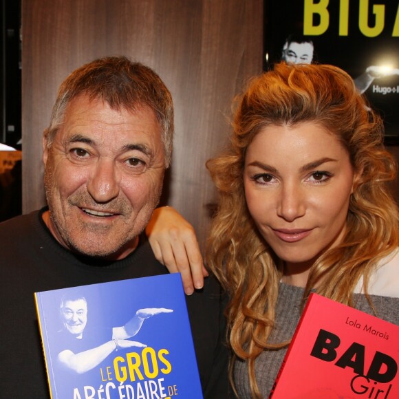 Jean-Marie Bigard et sa femme Lola Marois lors du salon du livre de Paris le 17 Mars 2018 à la Porte de Versailles de Paris. © Denis Guignebourg/Bestimage