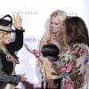 Anastacia, Maria Bravo et Pamela Anderson assistent au Global Gift Gala Madrid au musée Thyssen à Madrid en Espagne, le 22 mars 2018.