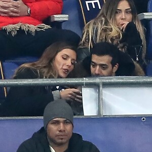 Exclusif - Camille Cerf et Tarek Boudali dans les tribunes du Stade de France lors du match de football amical France - Colombie à Saint-Denis le 23 mars 2018
