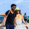 Exclusif - Eva Longoria très enceinte se balade avec son mari José Baston sur une plage à Miami, le 26 mars 2018.