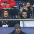 Exclusif - Camille Cerf et Tarek Boudali dans les tribunes du Stade de France lors du match de football amical France - Colombie à Saint-Denis le 23 mars 2018.