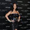 Rihanna assiste au lancement de sa marque de maquillage "Fenty by Rihanna" à Milan, le 5 avril 2018.