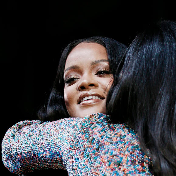 Rihanna assiste au lancement de sa marque de maquillage "Fenty by Rihanna" à Milan, le 5 avril 2018.