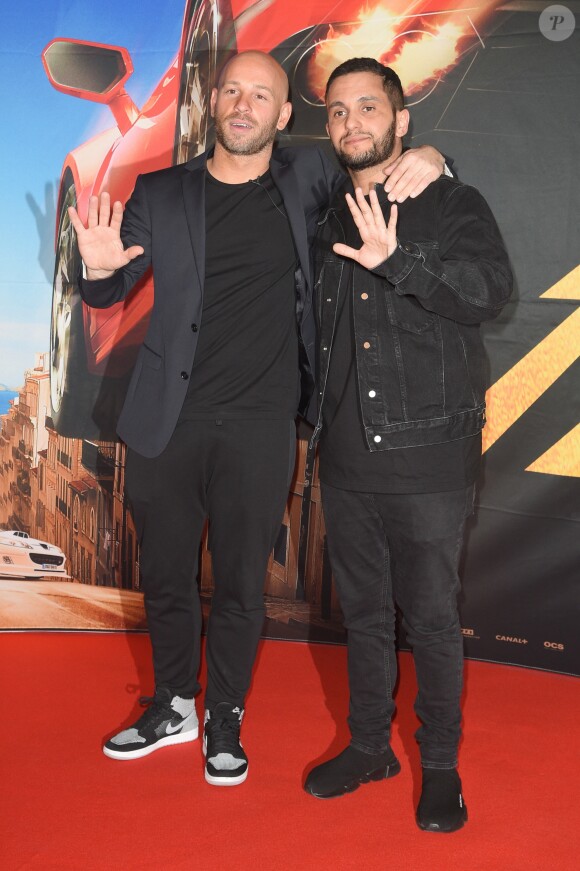 Franck Gastambide et Malik Bentalha - Avant-première du film "Taxi 5" au cinéma le Grand Rex à Paris, France, le 8 avril 2018. © Coadic Guirec/Bestimage