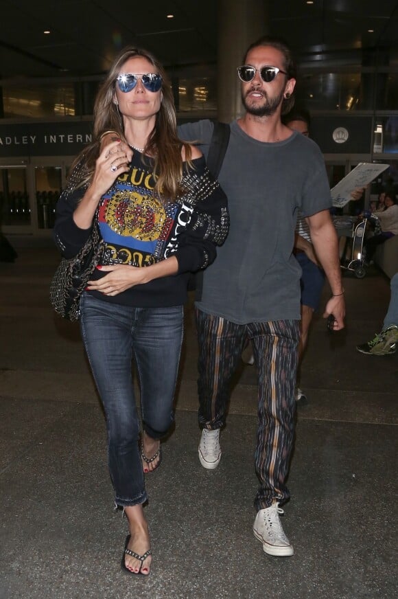 Heidi Klum et son compagnon Tom Kaulitz à l'aéroport de LAX à Los Angeles, le 12 avril 2018.