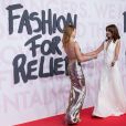  Natalia Vodianova et Carla Bruni-Sarkozy (en robe Dior) lors du photocall du défilé de mode "Fashion For Relief" lors du Festival International du Film de Cannes, France, le 13 mai 2018. © Cyril Moreau/Bestimage 