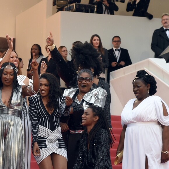 Le collectif des 16 actrices "Noire n'est pas mon métier" : Nadege Beausson-Diagne, Mata Gabin, Maïmouna Gueye, Eye Haïdara, Rachel Khan, Aïssa Maïga, Sara Martins, Marie-Philomène NGA, Sabine Pakora, Firmine Richard, Sonia Rolland, Magaajyia Silberfeld, Shirley Souagnon, Assa Sylla, Karidja Touré, France Zobda (Habillées en Balmain) - Montée des marches du film " Burning " lors du 71ème Festival International du Film de Cannes. Le 16 mai 2018 © Giancarlo Gorassini / Bestimage