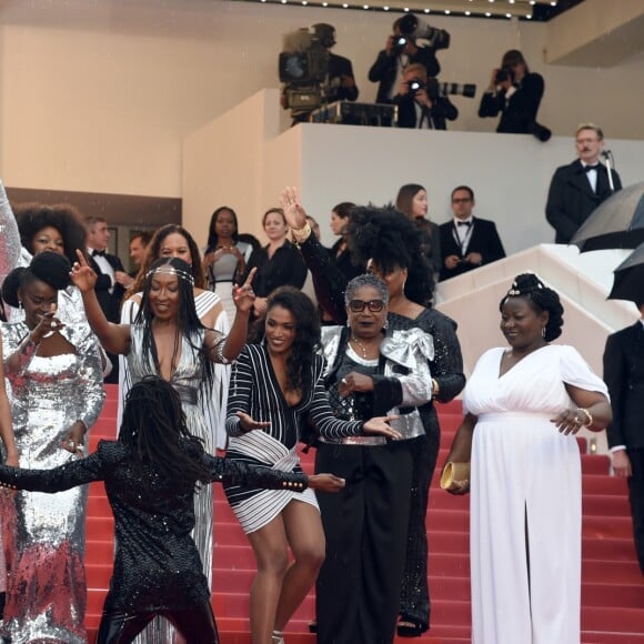 Le collectif des 16 actrices "Noire n'est pas mon métier" : Nadege Beausson-Diagne, Mata Gabin, Maïmouna Gueye, Eye Haïdara, Rachel Khan, Aïssa Maïga, Sara Martins, Marie-Philomène NGA, Sabine Pakora, Firmine Richard, Sonia Rolland, Magaajyia Silberfeld, Shirley Souagnon, Assa Sylla, Karidja Touré, France Zobda (Habillées en Balmain) - Montée des marches du film " Burning " lors du 71ème Festival International du Film de Cannes. Le 16 mai 2018 © Giancarlo Gorassini / Bestimage