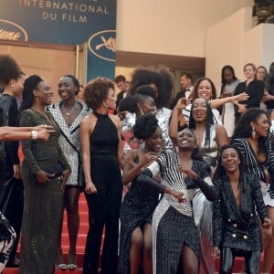 Le collectif des 16 actrices "Noire n'est pas mon métier" : Nadege Beausson-Diagne, Mata Gabin, Maïmouna Gueye, Eye Haïdara, Rachel Khan, Aïssa Maïga, Sara Martins, Marie-Philomène NGA, Sabine Pakora, Firmine Richard, Sonia Rolland, Magaajyia Silberfeld, Shirley Souagnon, Assa Sylla, Karidja Touré, France Zobda (Habillées en Balmain) - Montée des marches du film " Burning " lors du 71ème Festival International du Film de Cannes. Le 16 mai 2018 © Giancarlo Gorassini / Bestimage