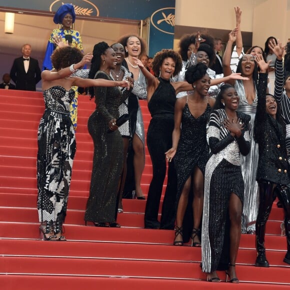 Le collectif des 16 actrices "Noire n'est pas mon métier" : Nadege Beausson-Diagne, Mata Gabin, Maïmouna Gueye, Eye Haïdara, Rachel Khan, Aïssa Maïga, Sara Martins, Marie-Philomène NGA, Sabine Pakora, Firmine Richard, Sonia Rolland, Magaajyia Silberfeld, Shirley Souagnon, Assa Sylla, Karidja Touré, France Zobda (Habillées en Balmain) - Montée des marches du film " Burning " lors du 71ème Festival International du Film de Cannes. Le 16 mai 2018 © Giancarlo Gorassini / Bestimage