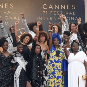 Khadja Nin, le collectif des 16 actrices "Noire n'est pas mon métier" : Nadege Beausson-Diagne, Mata Gabin, Maïmouna Gueye, Eye Haïdara, Rachel Khan, Aïssa Maïga, Sara Martins, Marie-Philomène NGA, Sabine Pakora, Firmine Richard, Sonia Rolland, Magaajyia Silberfeld, Shirley Souagnon, Assa Sylla, Karidja Touré, France Zobda (Habillées en Balmain) - Montée des marches du film « Burning » lors du 71ème Festival International du Film de Cannes. Le 16 mai 2018 © Giancarlo Gorassini / Bestimage  Red carpet for the movie « Burning » during the 71th Cannes International Film festival. On may 16th 201816/05/2017 - 