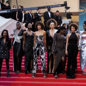 Le collectif des 16 actrices "Noire n'est pas mon métier" : Nadege Beausson-Diagne, Mata Gabin, Maïmouna Gueye, Eye Haïdara, Rachel Khan, Aïssa Maïga, Sara Martins, Marie-Philomène NGA, Sabine Pakora, Firmine Richard, Sonia Rolland, Magaajyia Silberfeld, Shirley Souagnon, Assa Sylla, Karidja Touré, France Zobda (Habillées en Balmain) - Montée des marches du film " Burning " lors du 71ème Festival International du Film de Cannes. Le 16 mai 2018 © Borde-Jacovides-Moreau/Bestimage