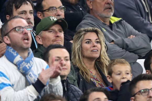 Denis Brogniart et Sophie Tapie - Les célébrités dans les tribunes assistent à la finale de la Ligue Europa, l'Olympique de Marseille contre l'Atlético de Madrid au stade Groupama à Decines-Charpieu banlieue de Lyon, France, le 16 mai 2018. L'Atlético de Madrid a gagné 3-0. © Cyril Moreau/Bestimage