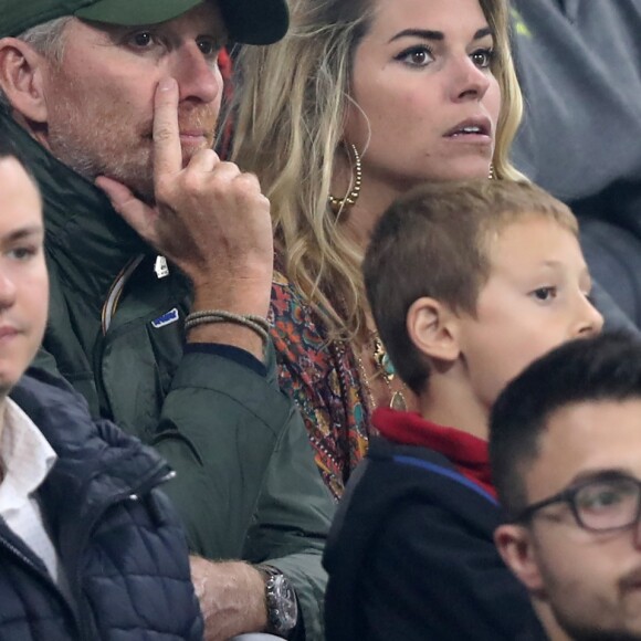 Denis Brogniart et Sophie Tapie - Les célébrités dans les tribunes assistent à la finale de la Ligue Europa, l'Olympique de Marseille contre l'Atlético de Madrid au stade Groupama à Decines-Charpieu banlieue de Lyon, France, le 16 mai 2018. L'Atlético de Madrid a gagné 3-0. © Cyril Moreau/Bestimage