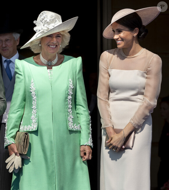 Camilla Parker Bowles, duchesse de Cornouailles, Meghan Markle, duchesse de Sussex lors de la garden party pour les 70 ans du prince Charles au palais de Buckingham à Londres. Le 22 mai 2018