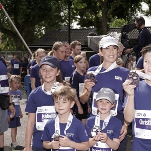 La princesse Mary de Danemark avec ses enfants la princesse Isabella, le prince Vincent, la princesse Josephine et le prince Christian à la Royal Run organisée pour les 50 ans du prince Frederik, à Copenhague/Frederiksberg, le 21 mai 2018.