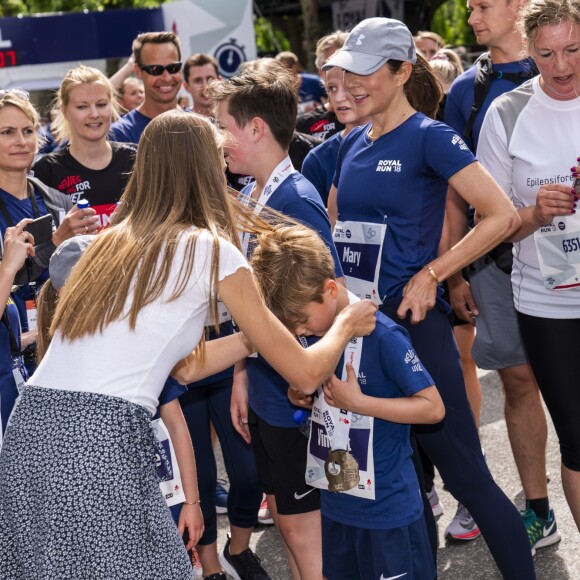 La princesse Mary de Danemark et ses enfants le prince Christian, la princesse Isabella, le prince Vincent et la princesse Josephine ont couru la Royal Run organisée pour les 50 ans du prince Frederik, à Copenhague/Frederiksberg, le 21 mai 2018.