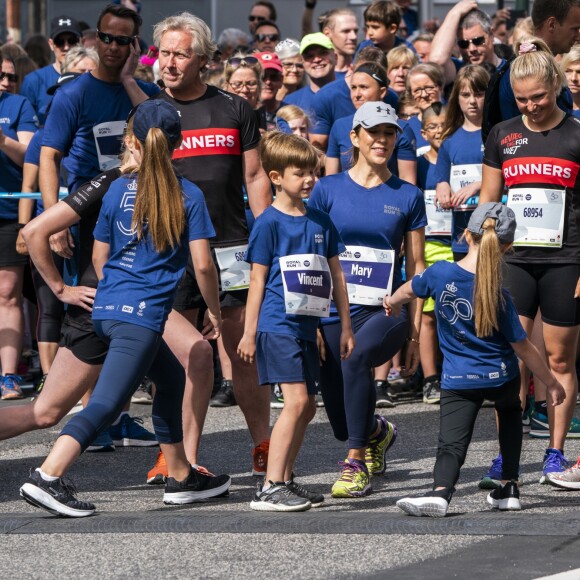 La princesse Mary de Danemark et ses enfants le prince Christian, la princesse Isabella, le prince Vincent et la princesse Josephine ont couru la Royal Run organisée pour les 50 ans du prince Frederik, à Copenhague/Frederiksberg, le 21 mai 2018.