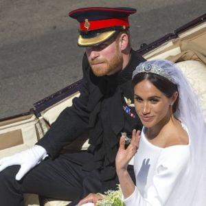 Le prince Harry, duc de Sussex, et Meghan Markle, duchesse de Sussex, en calèche au château de Windsor après la cérémonie de leur mariage au château de Windsor, Royaume Uni, le 19 mai 2018.