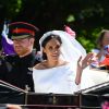 Le prince Harry, duc de Sussex, et Meghan Markle, duchesse de Sussex, en calèche à la sortie du château de Windsor après leur mariage le 19 mai 2018.