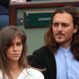 Ophélie Meunier et son mari Mathieu Vergne dans les tribunes lors des Internationaux de France de Tennis de Roland-Garros à Parisle 1er juin 2018.