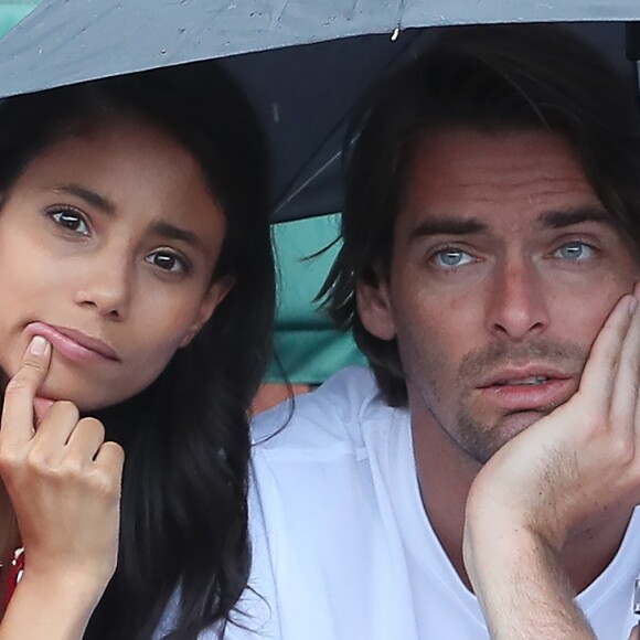 Camille Lacourt et Hajiba Fahmy - People dans les tribunes lors des internationaux de tennis de Roland Garros à Paris le 4 juin 2018.