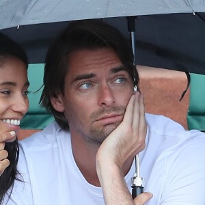 Camille Lacourt et Hajiba Fahmy - People dans les tribunes lors des internationaux de tennis de Roland Garros à Paris le 4 juin 2018.