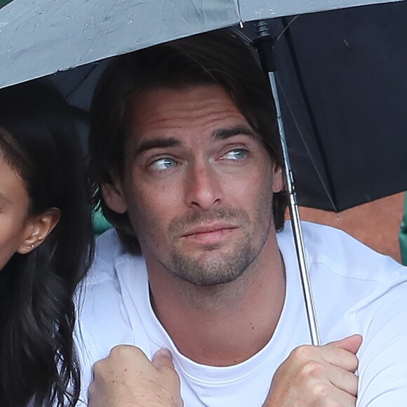 Camille Lacourt et Hajiba Fahmy - People dans les tribunes lors des internationaux de tennis de Roland Garros à Paris le 4 juin 2018.