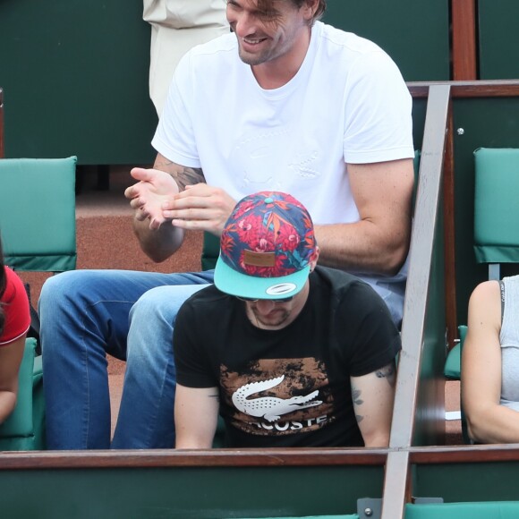 Camille Lacourt et Hajiba Fahmy - People dans les tribunes lors des internationaux de tennis de Roland Garros à Paris le 4 juin 2018.