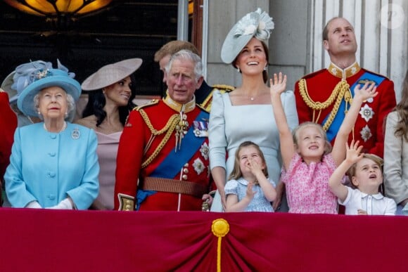 La reine Elisabeth II d'Angleterre, Meghan Markle, duchesse de Sussex, le prince Harry, duc de Sussex, le prince Charles, Kate Catherine Middleton, duchesse de Cambridge, le prince William, duc de Cambridge, la princesse Charlotte, Savannah Phillips, le prince George - Les membres de la famille royale britannique lors du rassemblement militaire "Trooping the Colour" (le "salut aux couleurs"), célébrant l'anniversaire officiel du souverain britannique. Cette parade a lieu à Horse Guards Parade, chaque année au cours du deuxième samedi du mois de juin. Londres, le 9 juin 2018.