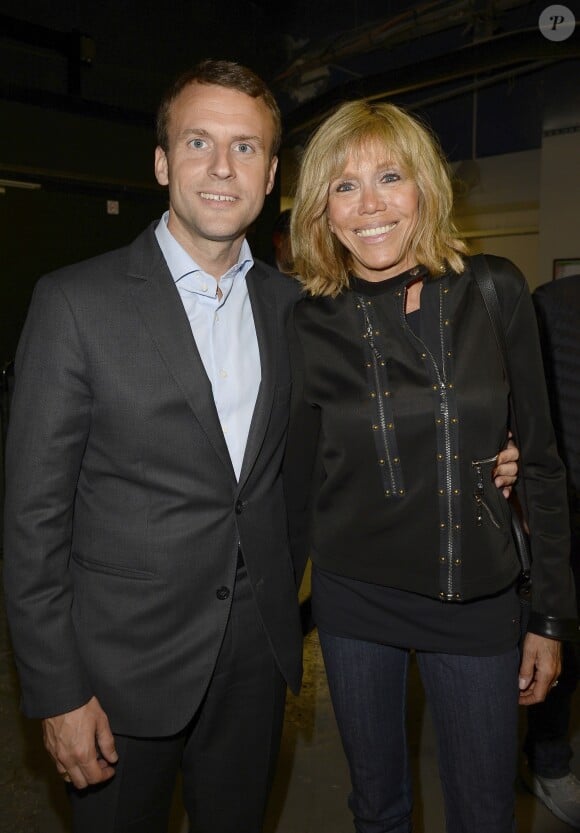 Semi-exclusif - Emmanuel Macron et sa femme Brigitte Macron - Jour 4 - People en backstage du concert de Michel Polnareff à l'AccorHotels Arena de Paris le 11 mai 2016. © Coadic Guirec/Bestimage
