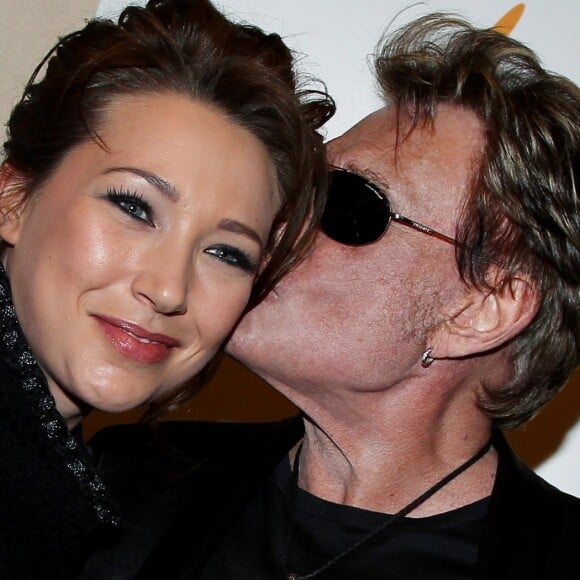 Laura Smet et Johnny Hallyday - Vente aux enchères des poupées "Frimousses des créateurs" à l'hôtel des ventes de Drouot au profit de l'Unicef, à Paris, le 13 décembre 2011.