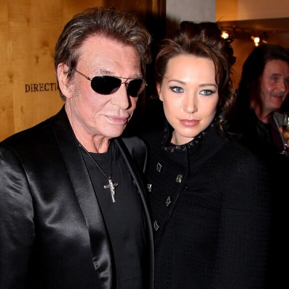 Laura Smet et Johnny Hallyday - Vente aux enchères des poupées "Frimousses des créateurs" à l'hôtel des ventes de Drouot au profit de l'Unicef, à Paris, le 13 décembre 2011.