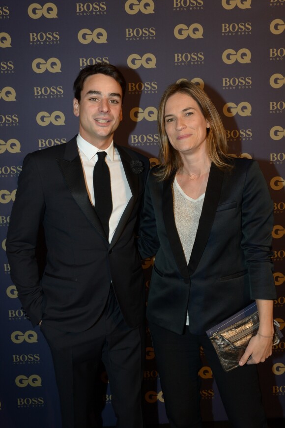 Julian Bugier et sa femme Claire Fournier lors de la soirée "L'homme de l'année GQ 2014" au Musée d'Orsay, à Paris le 19 novembre 2014.