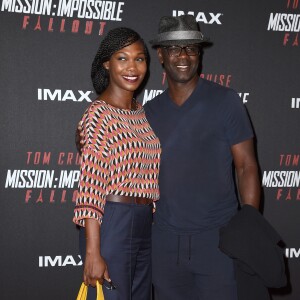 Lilian Thuram et sa compagne Kareen Guiock au photocall lors de l'avant-première mondiale de "Mission: Impossible Fallout" au Palais de Chaillot à Paris, le 12 juillet 2018. © Giancarlo Gorassini/Bestimage