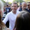 Le président de la République française Emmanuel Macron et sa femme la première dame Brigitte Macron viennent à la rencontre des nombreux vacanciers devant le Fort de Brégançon à Bormes-les-Mimosas, France, le 7 août 2018. Le couple présidentiel prend le temps d'échanger, de faire des photos et de saluer les nombreuses personnes venues devant le portail du fort. © Dominique Jacovides - Cyril Moreau/Bestimage