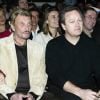 Johnny Hallyday, Laeticia et son père, André Boudou, à L'Amnésia le 25 mars 2004.