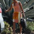 Exclusif - Doria Ragland a été aperçue à la sortie de son travail à Los Angeles. La mère de la Duchesse de Sussex porte une robe colorée, le 25 juillet 2018.
