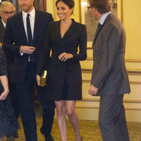 Le prince Harry, duc de Sussex et Meghan Markle, duchesse de Sussex, assistent à la comédie musicale "Hamilton" au théâtre Victoria Palace à Londres le 29 août 2018.