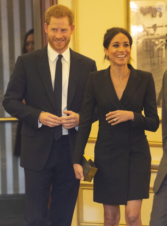 Le prince Harry, duc de Sussex et Meghan Markle, duchesse de Sussex, assistent à la comédie musicale "Hamilton" au théâtre Victoria Palace à Londres le 29 août 2018.