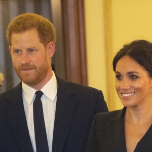 Le prince Harry, duc de Sussex et Meghan Markle, duchesse de Sussex, assistent à la comédie musicale "Hamilton" au théâtre Victoria Palace à Londres le 29 août 2018.